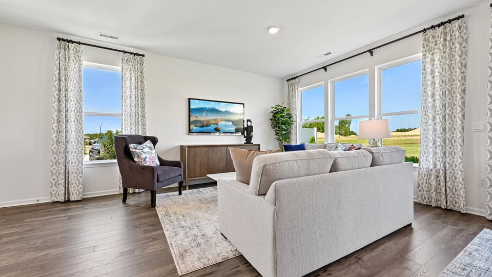 living room with revwood flooring