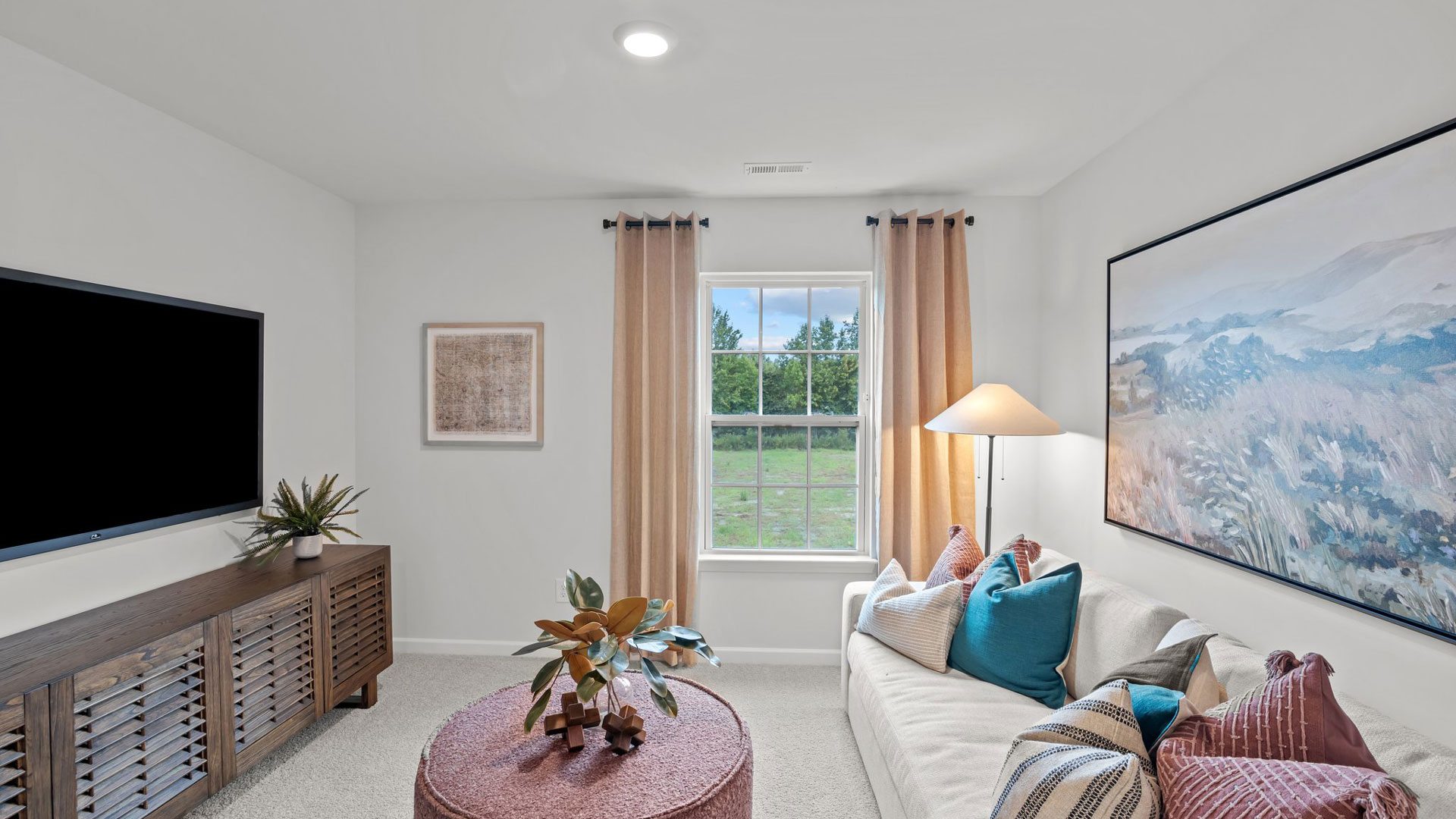 loft with carpet flooring