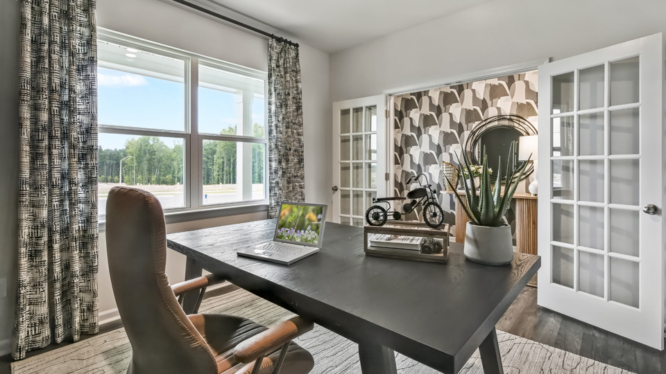 study with revwood flooring and french glass doors