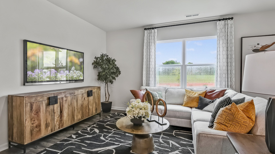 living room with revwood flooring