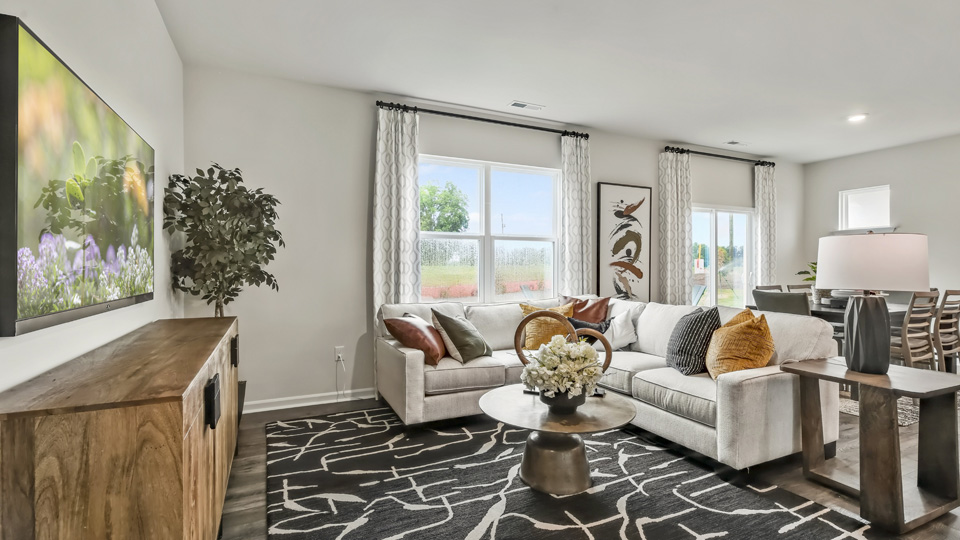 living room with revwood flooring