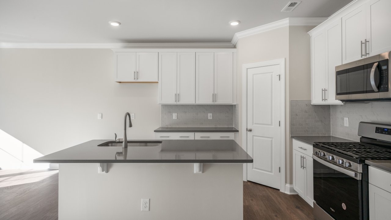 Kitchen with white cabinets