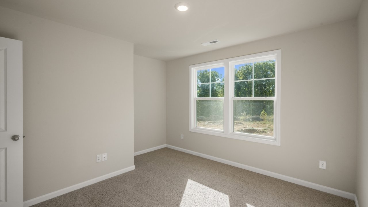 Bedroom with carpet