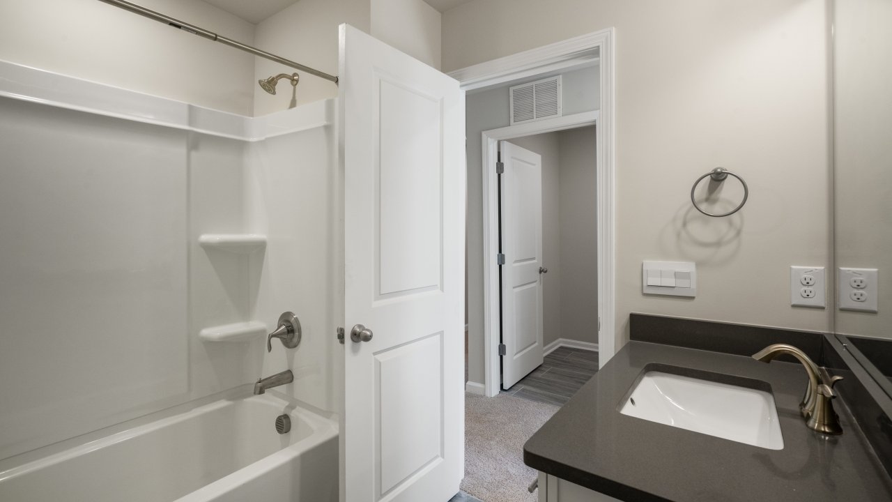 Bathroom with white cabinets