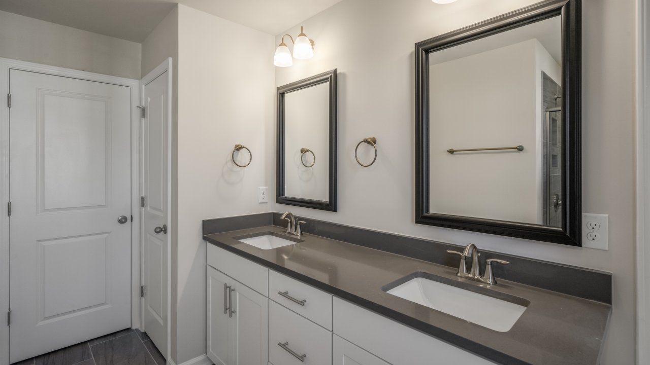 Bathroom with white cabinets