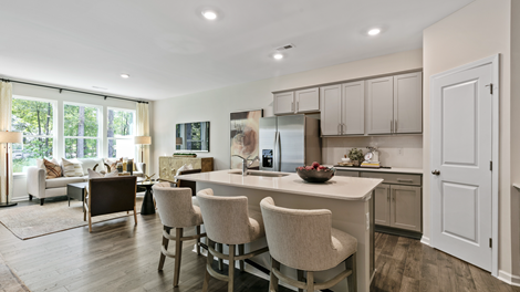 open concept living area with the living room next to the kitchen