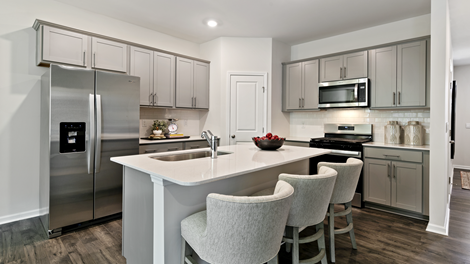 modern kitchen featuring light grey cabinetry, and stainless steel appliances