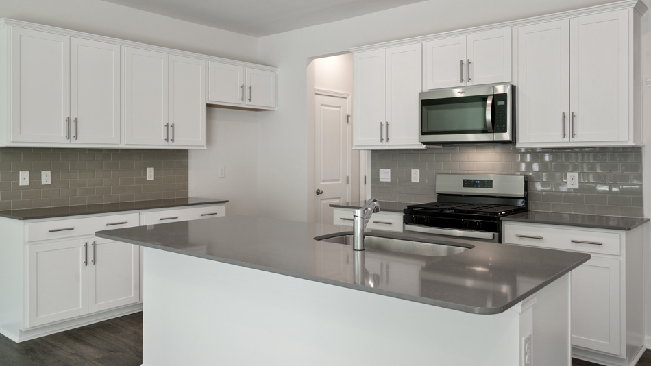 Kitchen with stainless-steel appliances