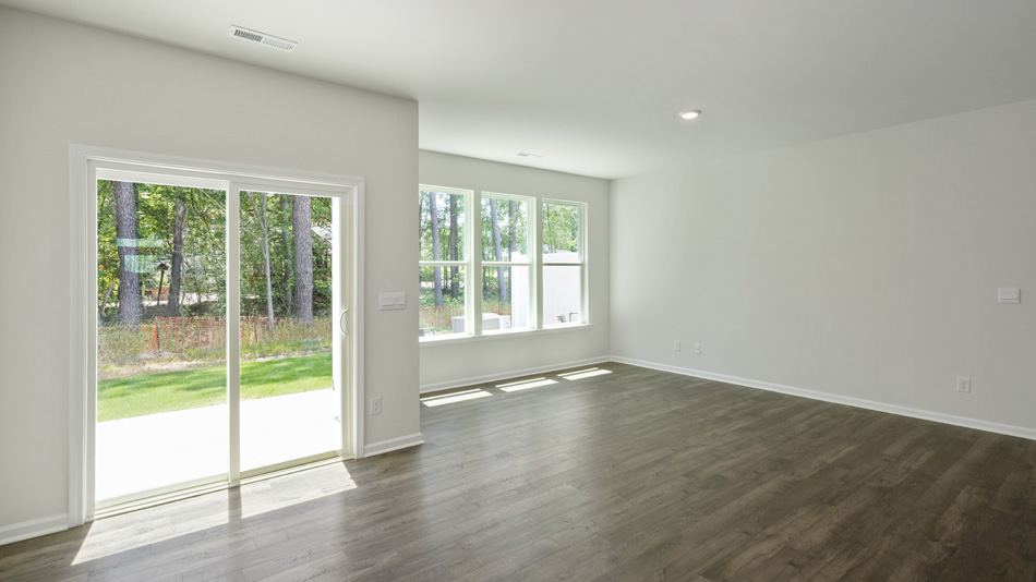 Open-concept dining area with sliding door