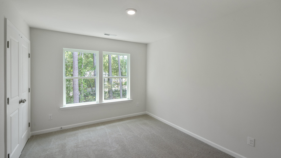 Bedroom with carpet flooring