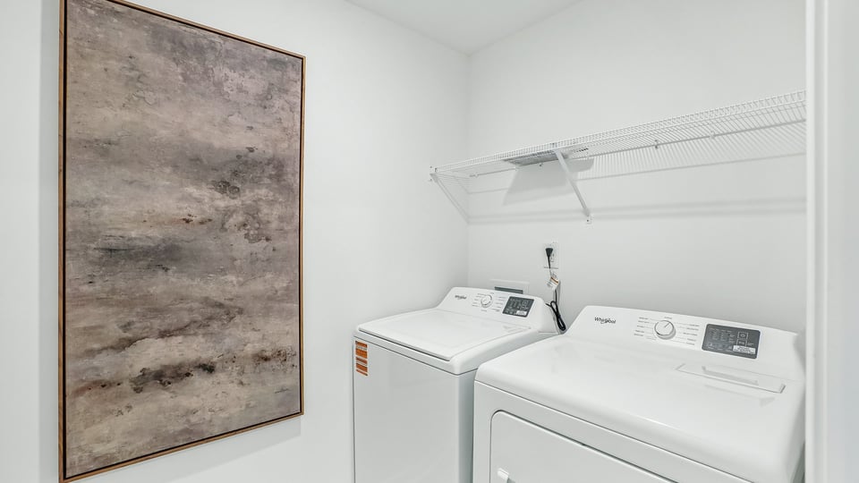 laundry room with washer and dryer