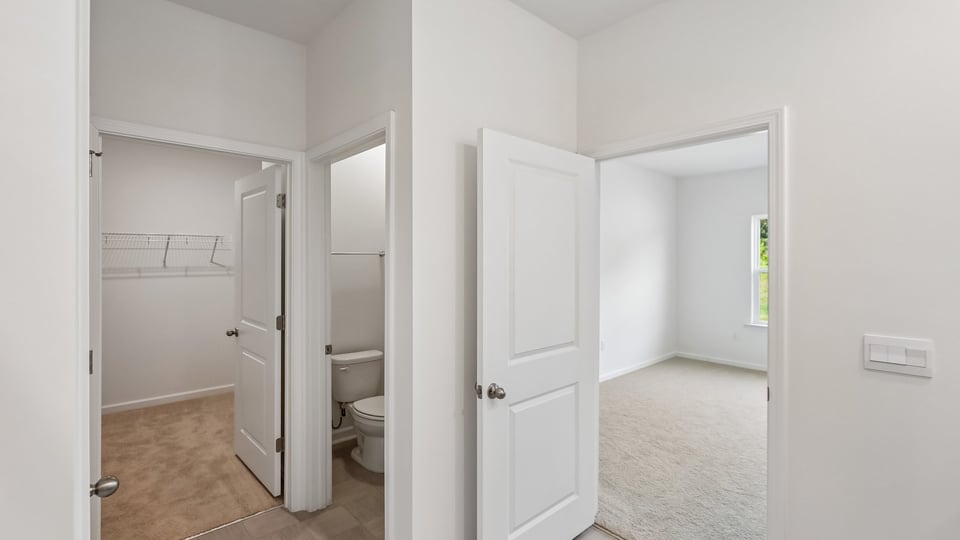 bathroom with walkin closet