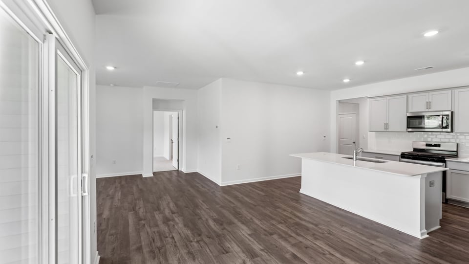 open concept living and kitchen areas