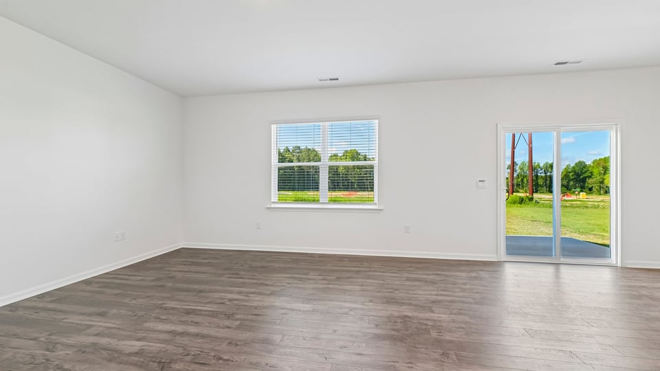 living room with sliding glass doors to patio
