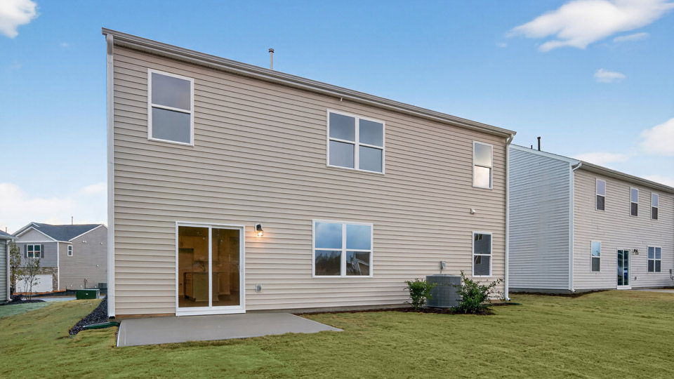 back of hayden with concrete patio