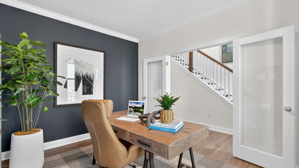 study with french glass doors and revwood flooring