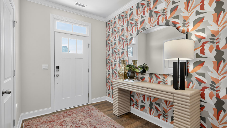 foyer entryway with revwood flooring