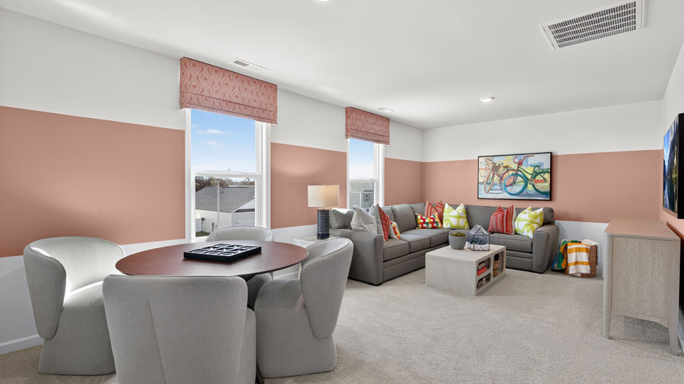 loft with carpet flooring