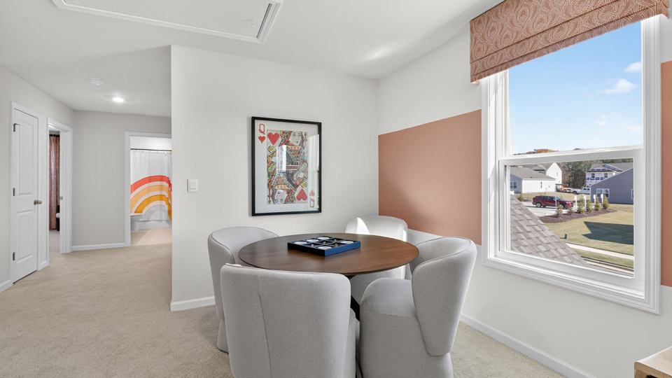 loft with carpet flooring