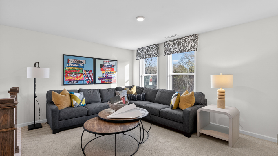 loft with carpet flooring