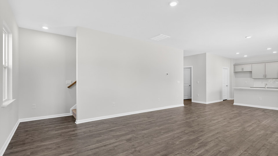 open concept living space with large windows