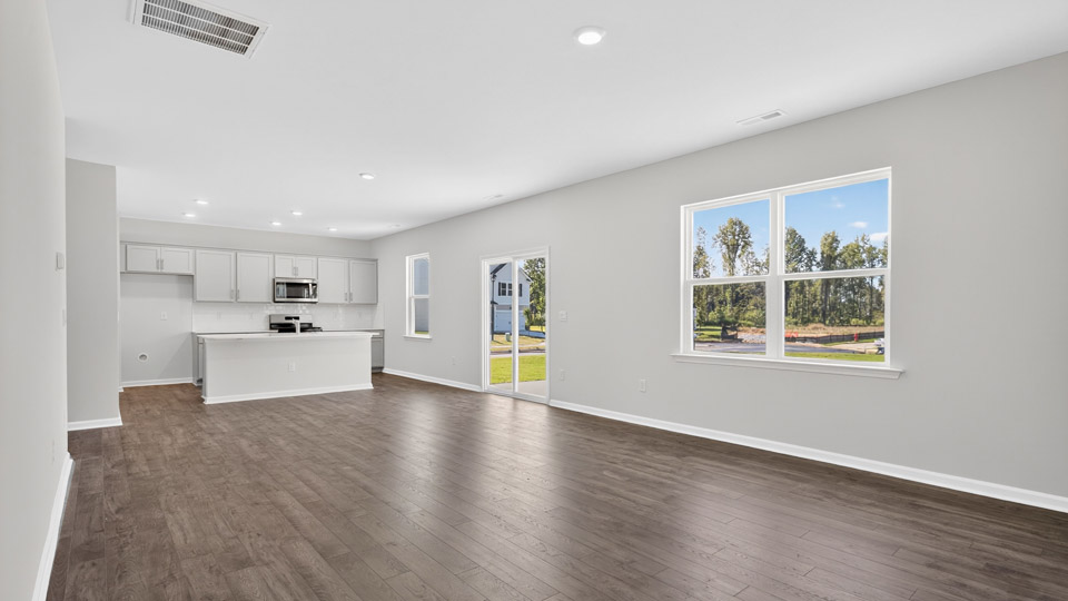 open concept living space with large windows