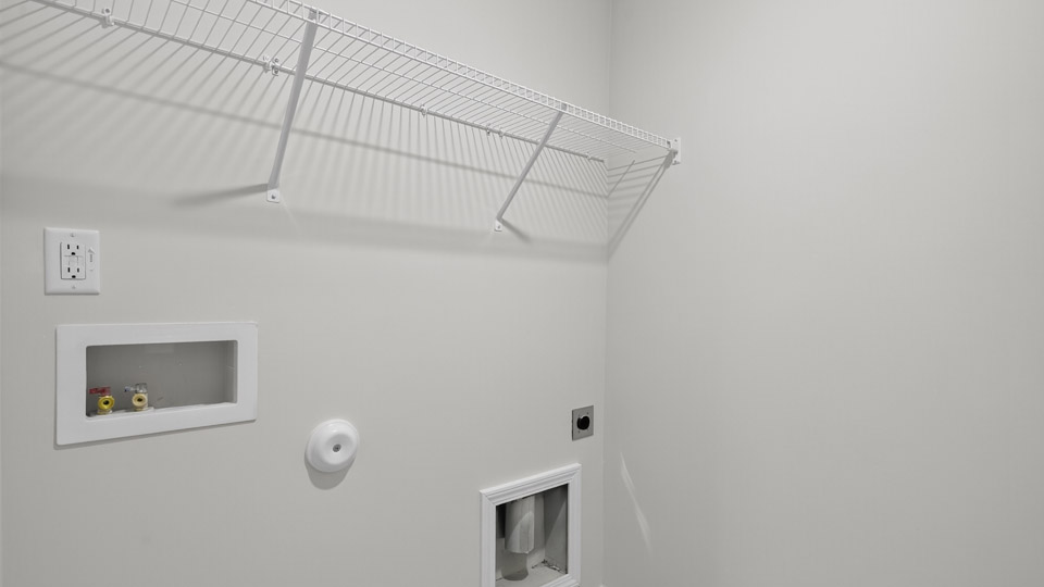 laundry room with wire shelving