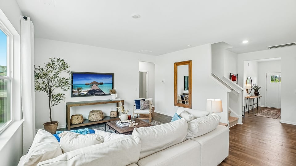 open concept living space with large windows