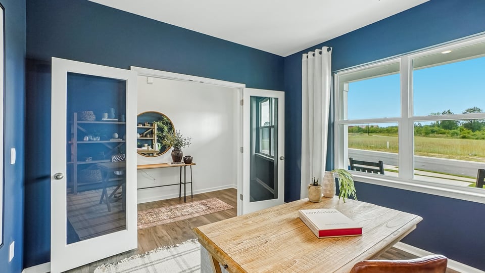 flex room with large windows, french doors