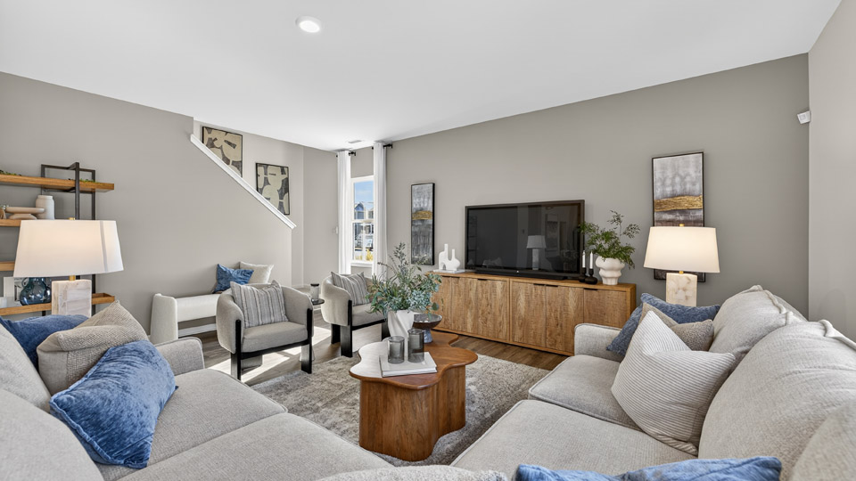 open concept living space with large windows