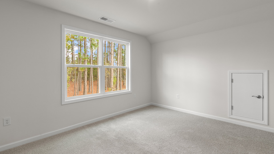 Possible bedroom with carpet flooring