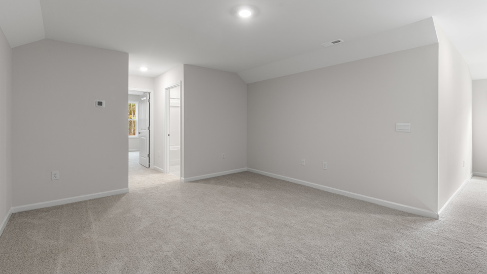 Possible bedroom with carpet flooring