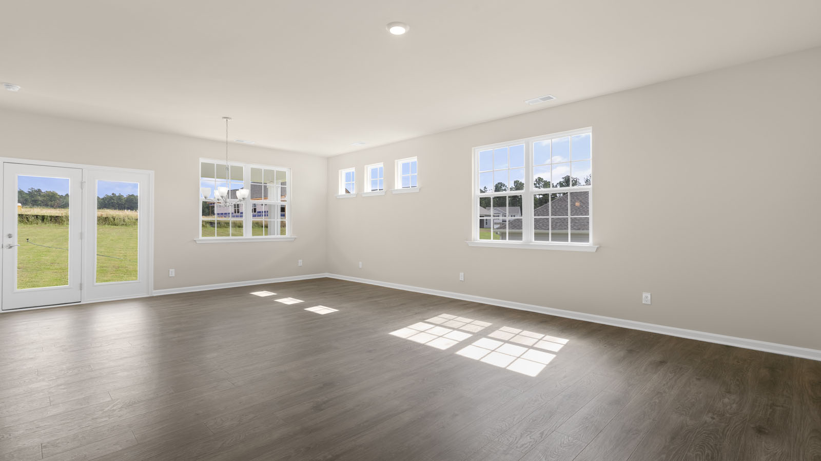 open concept living space with large windows