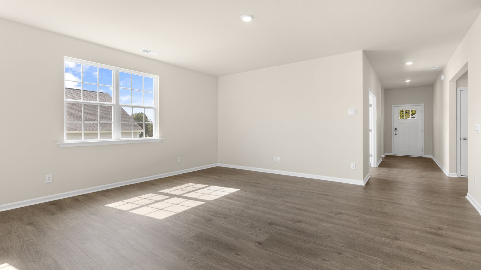 open concept living space with large windows