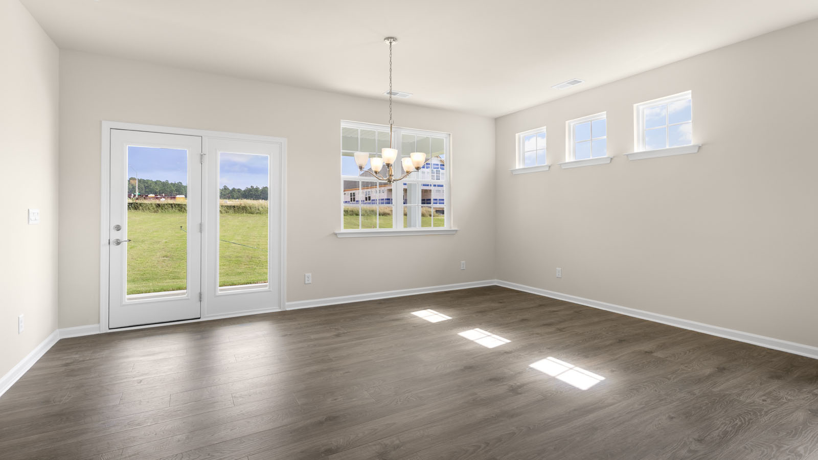 open concept living space with large windows