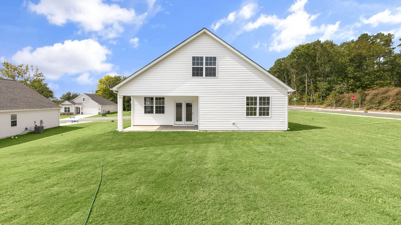 back exterior of clifton B4 with covered patio