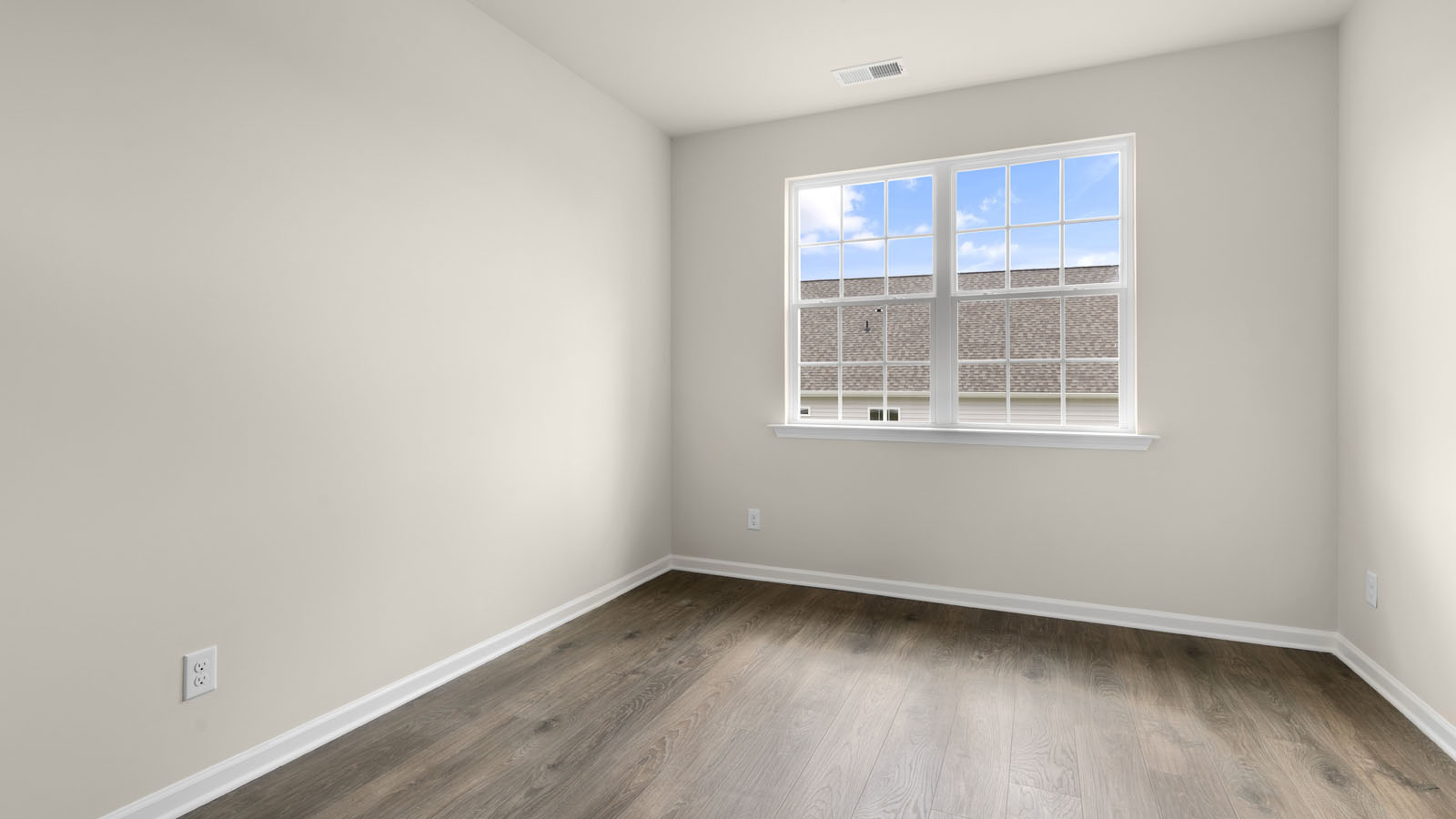 additional bedroom with window, carpeting, closet
