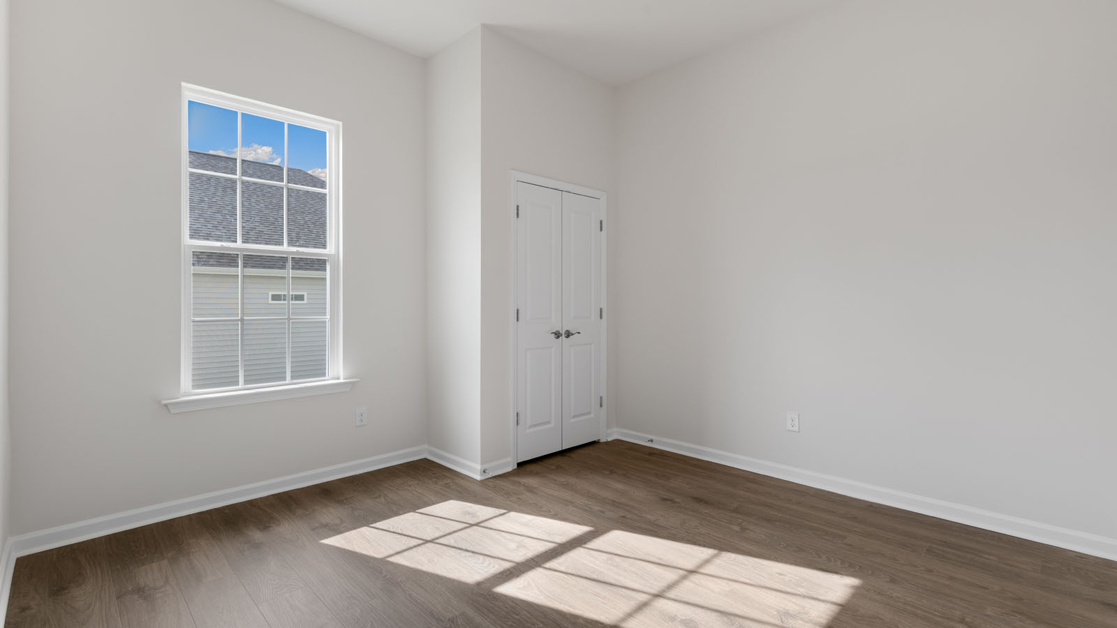Bedroom with revwood flooring