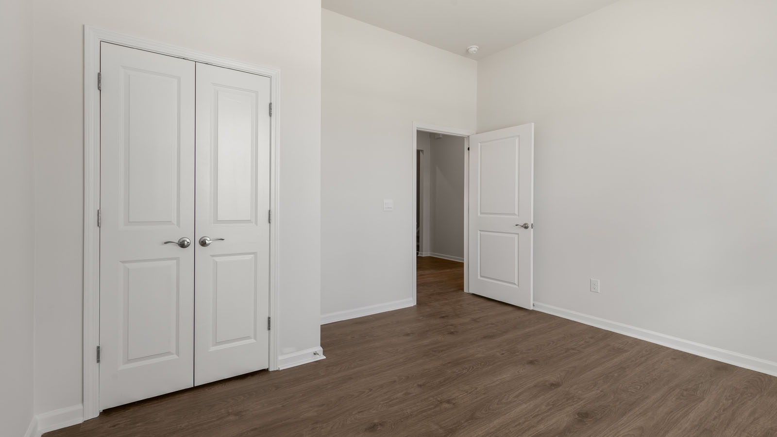 Bedroom with revwood flooring
