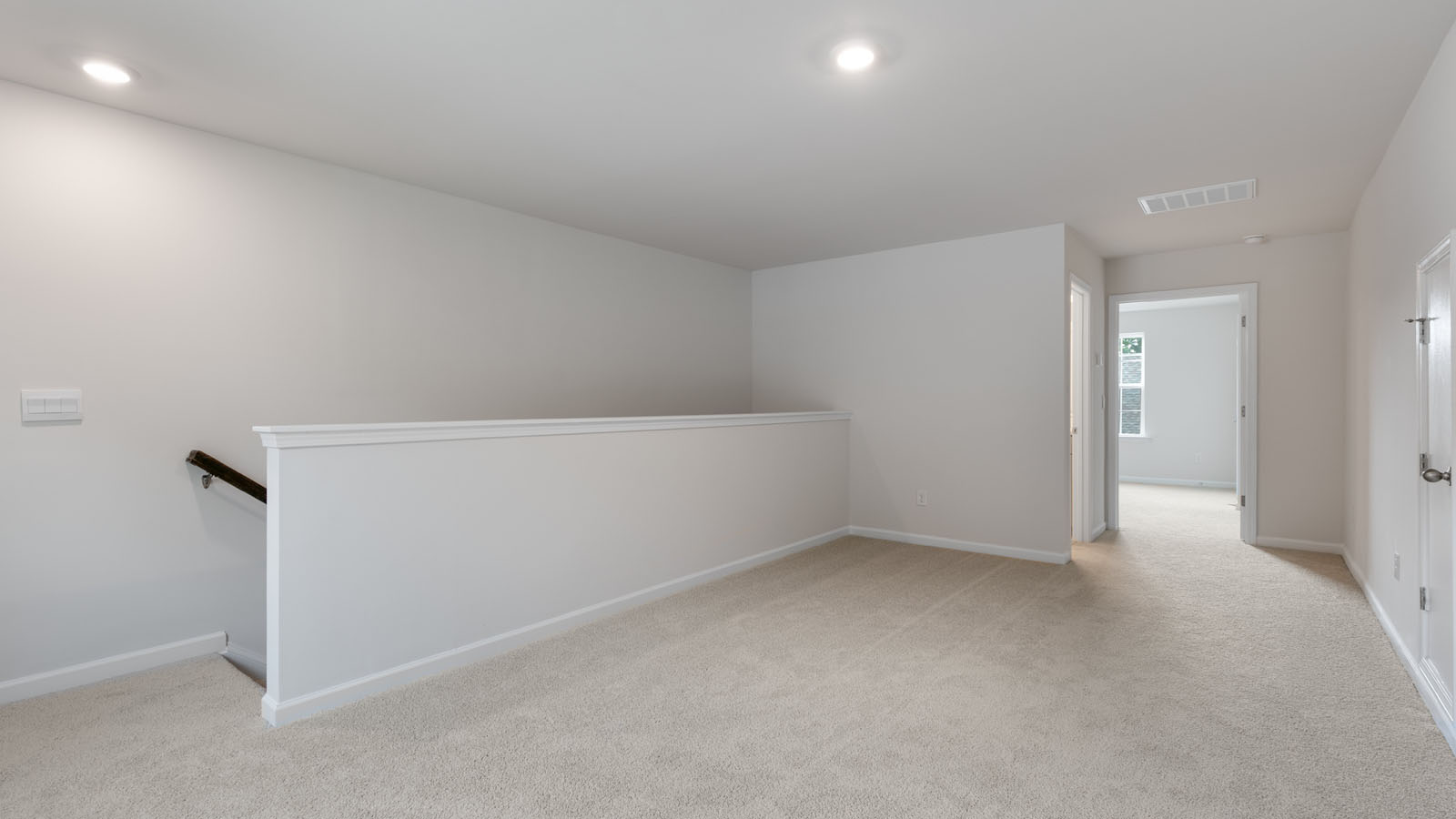 Loft with carpet flooring