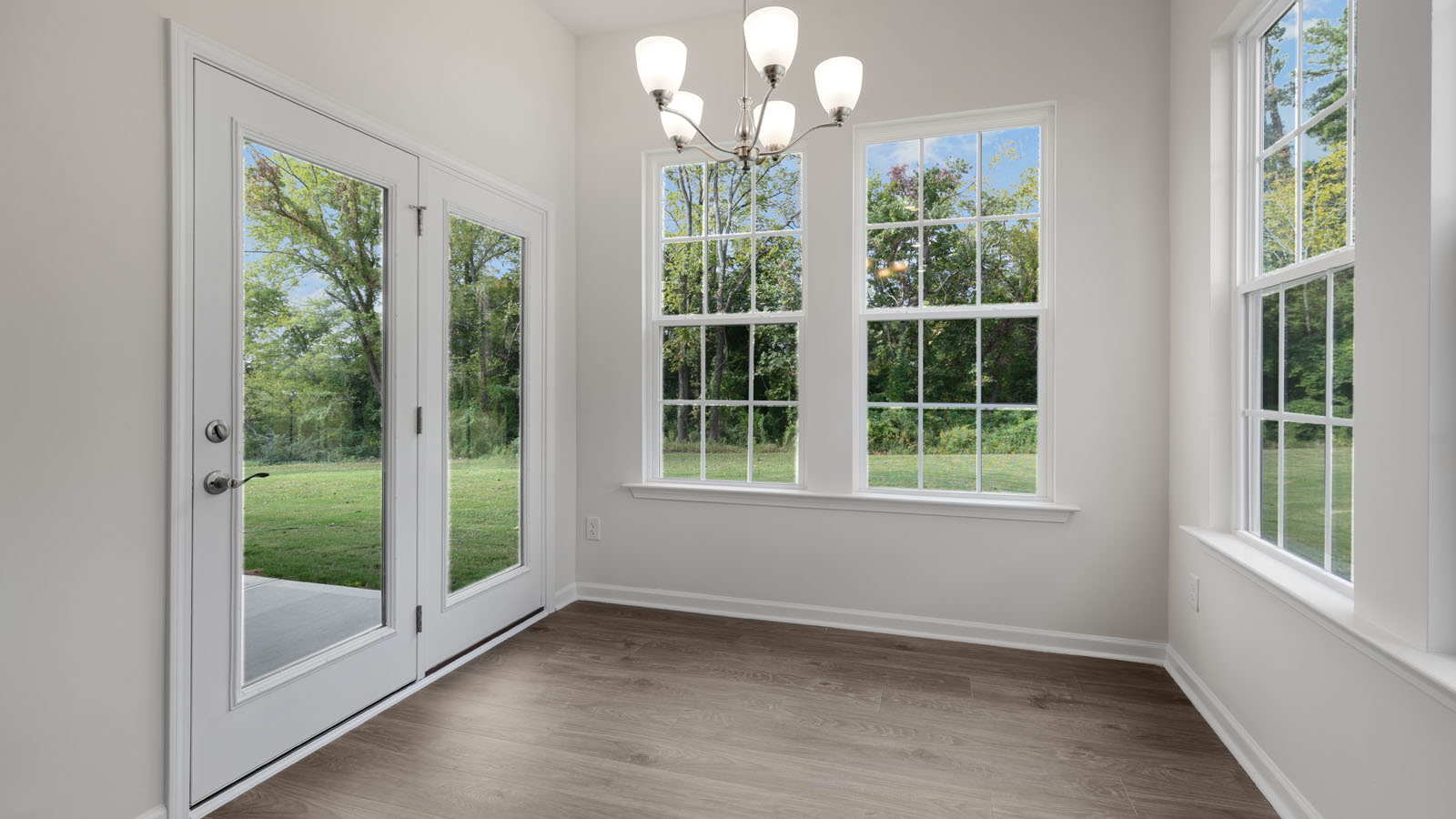 Dinging area with revwood flooring