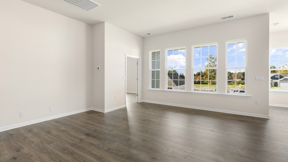 open concept living space with large windows