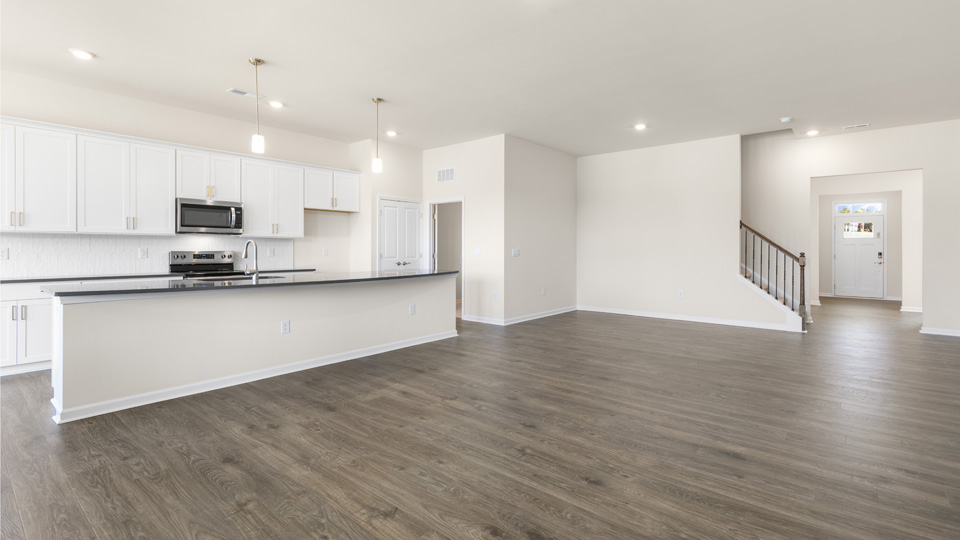 open concept living space with large windows