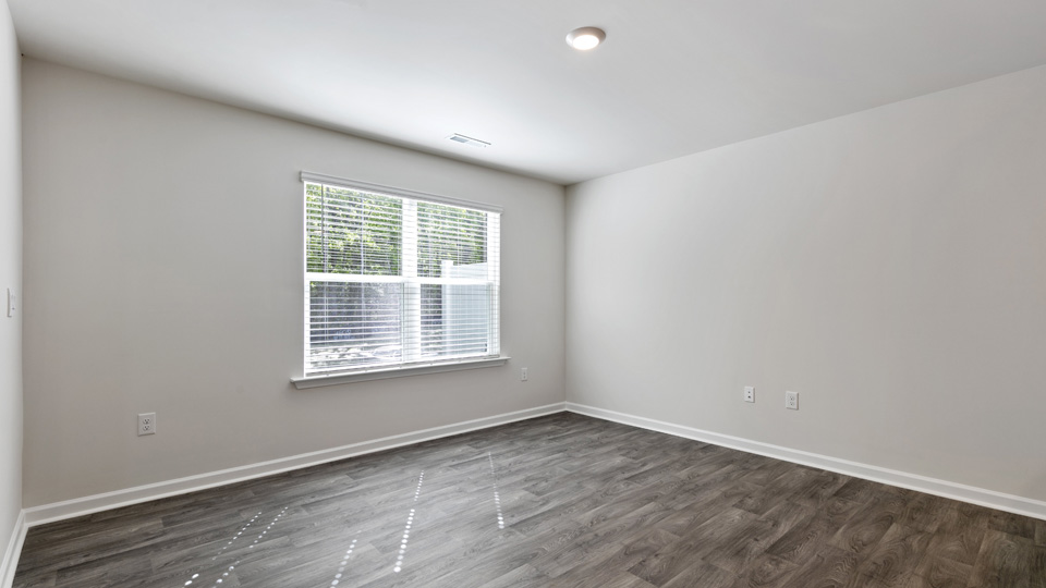 open concept living space with large windows