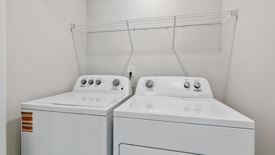 laundry room with wire shelving