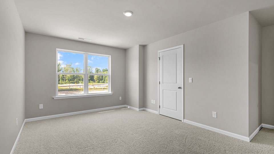 Bedroom with carpet floor and closet