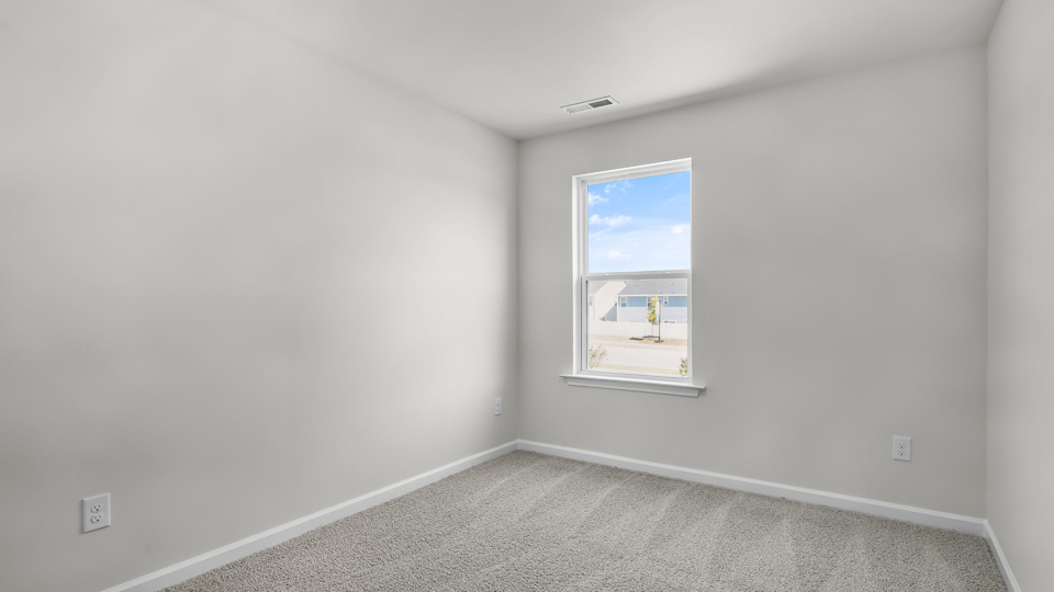 Bedroom with carpet floor and closet