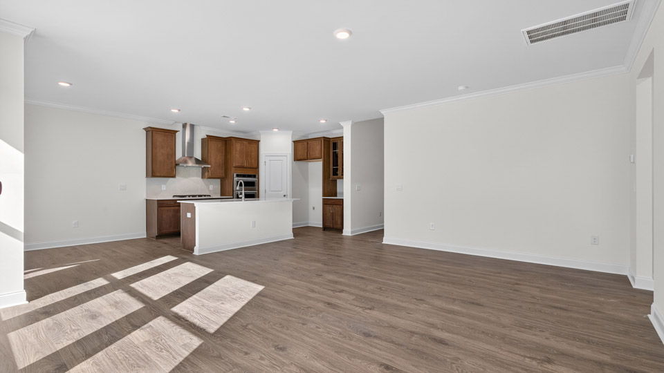 kitchen overlooking living room with revwood flooring