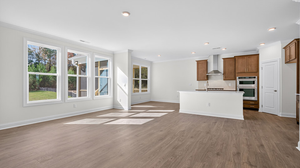 kitchen overlooking living room with revwood flooring