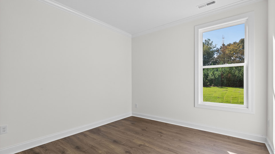 bedroom with revwood flooring